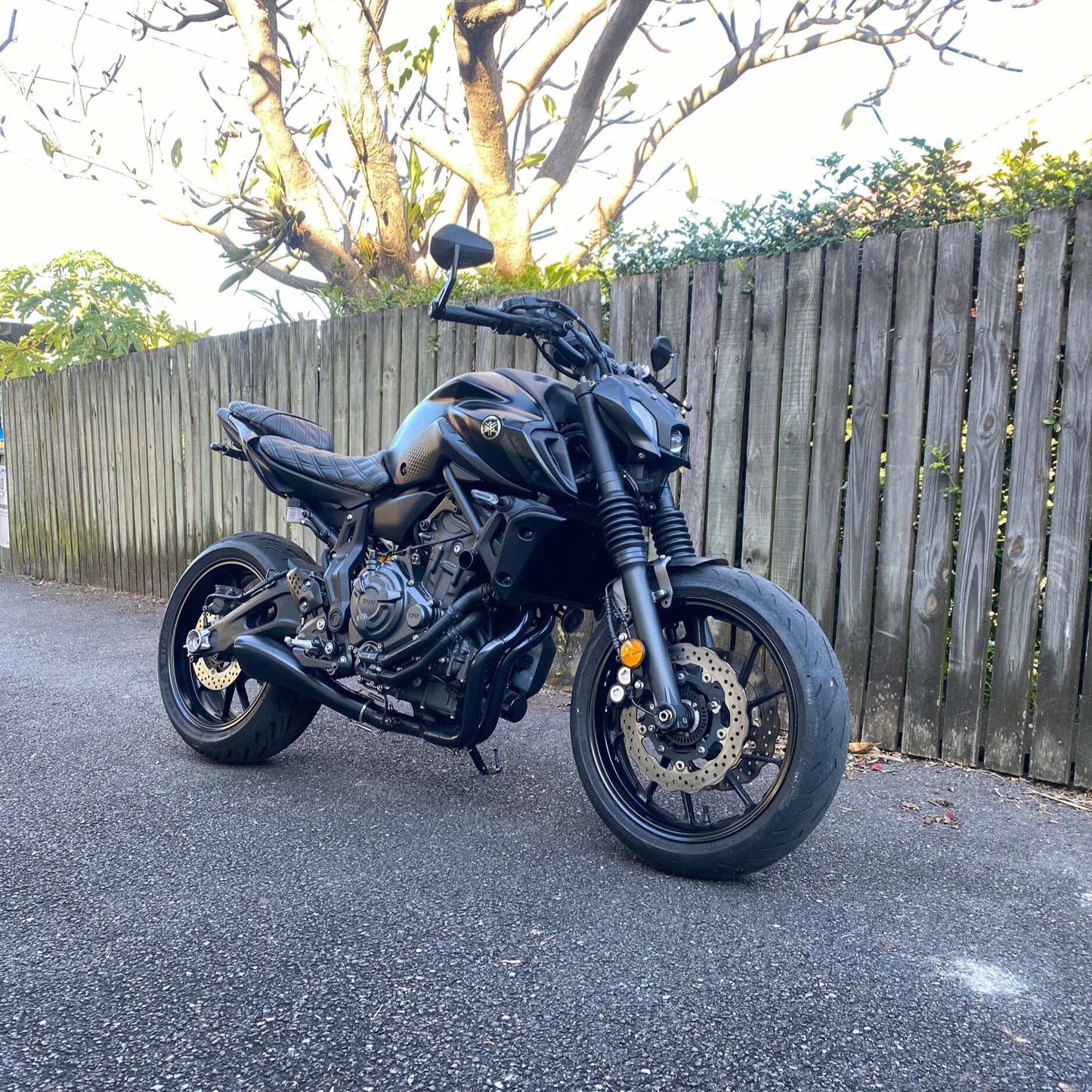 A Yamaha MT07 with a black Kelpi Alpha muffler installed