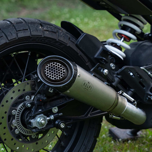A Kelpi Flanker Slip-on muffler that is on a Husqvarna 401