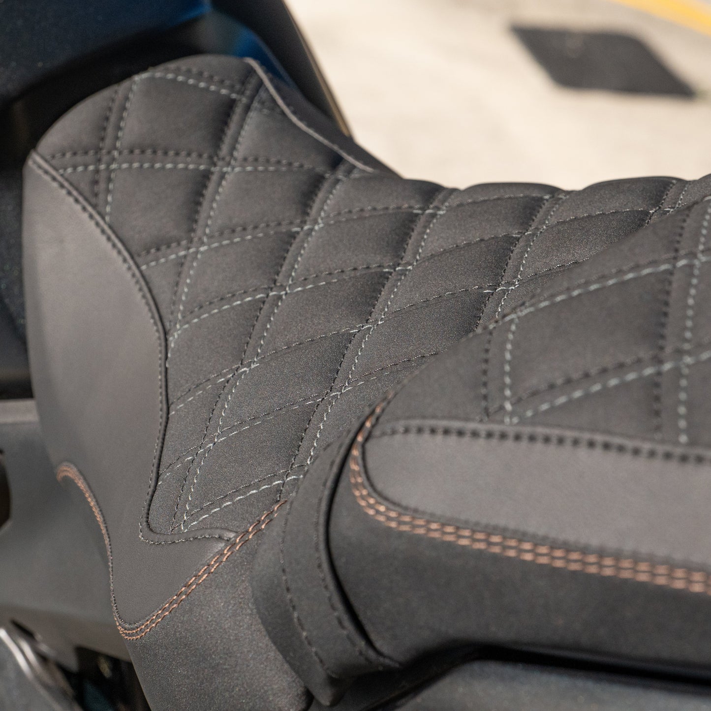 Honda CB650R with a Kelpi Custom Moto seat trim with a matching bronze detail stitch
