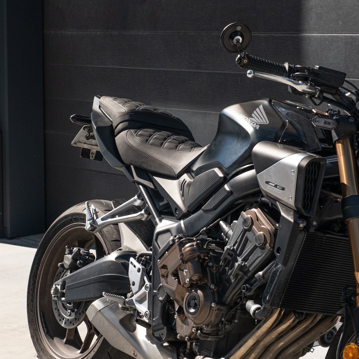 Honda CB650R with a Kelpi Custom Moto seat trim with a matching bronze detail stitch and Hindsight mirrors