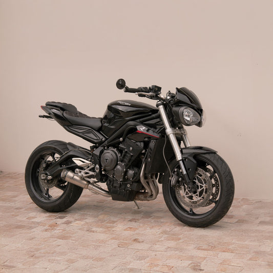 A Triumph Street Triple fitted with a Kelpi Custom Moto Flanker Slip-on Muffler