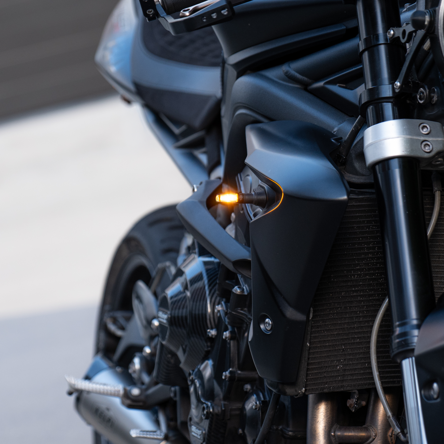 Kelpi Scout Indicator with Triumph Adaptors on a Street Triple