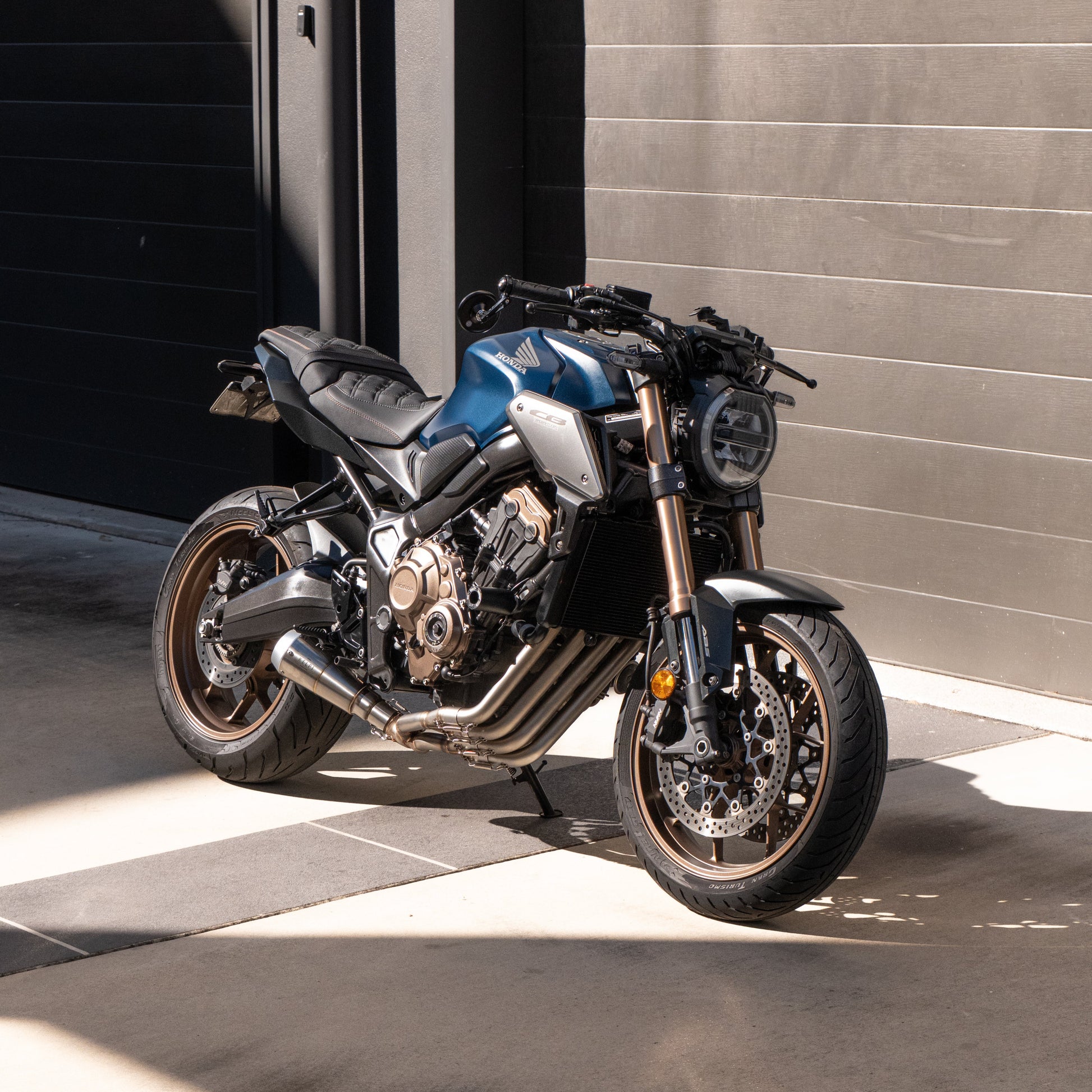 Motorcycle parked in front of a garage door